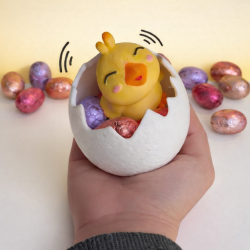 Oeuf magique Pâques enfant avec poussin surprise et chocolats